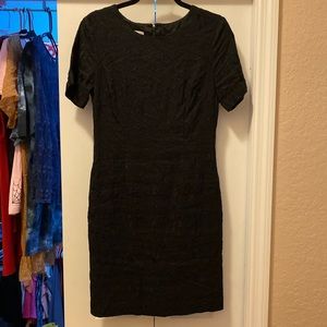 Black dress with flower embroidery.